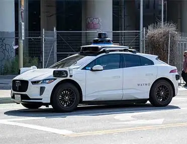 White car parked on street