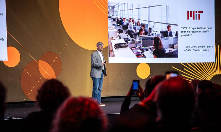 Dr Scott Zoldi, Chief Analytics Officer at FICO speaking at the London Blockchain Conference 2025 stage.